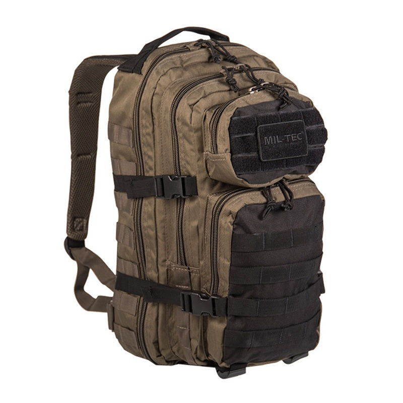 Tan and black assault backpack with padded straps, front zipper pocket, and MOLLE webbing