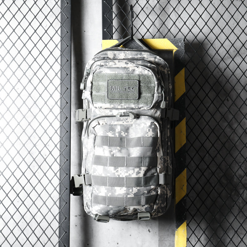 20L assault backpack back view with padded harness and camouflage webbing