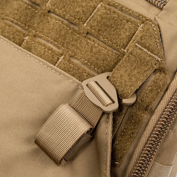 Coyote brown 14L assault pack with webbing and buckle strap detail