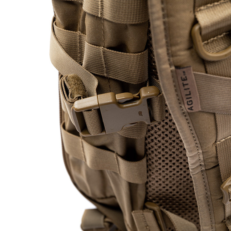 Tan assault pack side organizer with elastic slots and hook-and-loop pocket