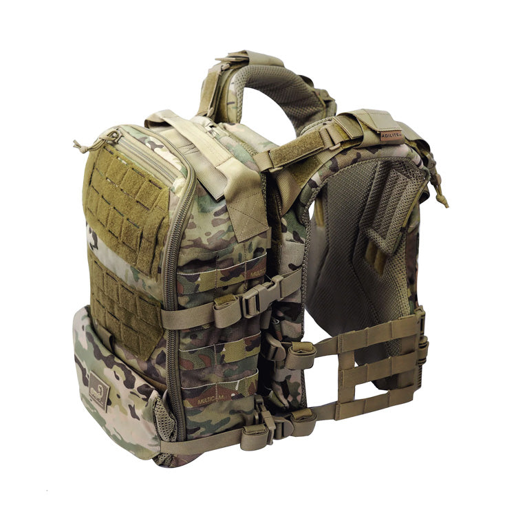 Multicam assault pack with tan trim, side webbing straps, and front MOLLE panels