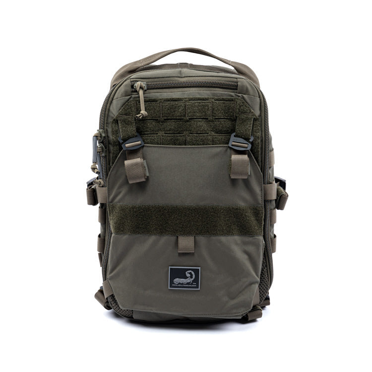 Green assault pack with front MOLLE panel and zippered organizer pocket