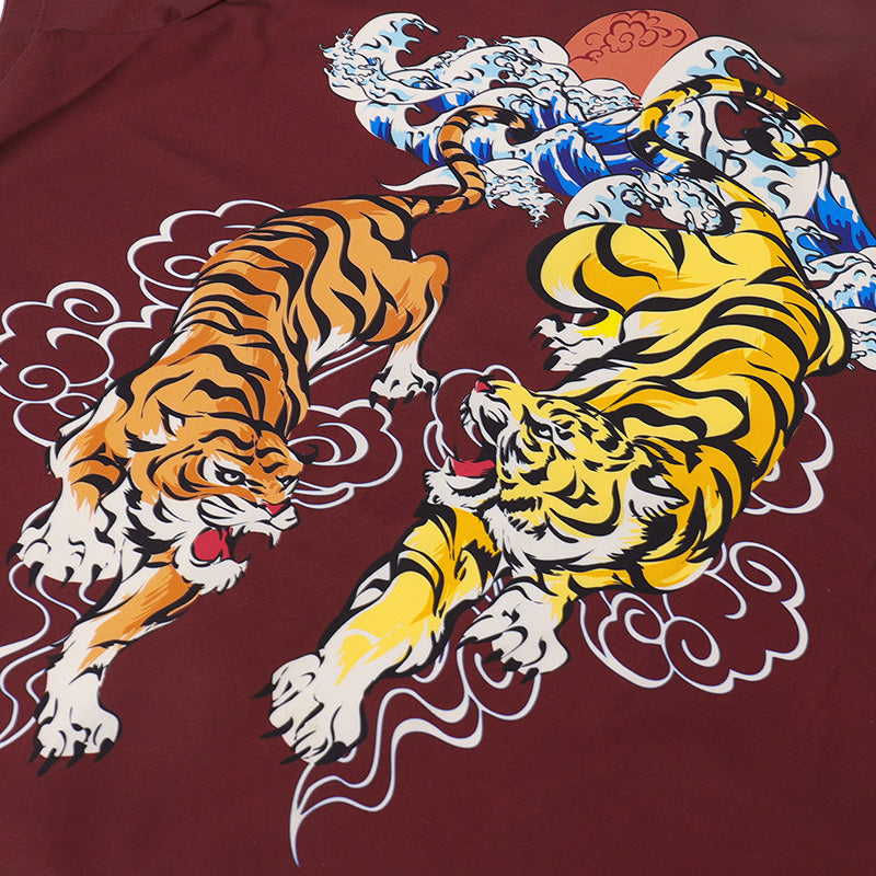 Burgundy resort shirt close-up, tiger face graphic with swirling cloud motifs
